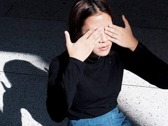 Woman-Covering-Eyes-With-Hands